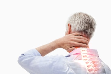 Digital composite of Highlighted spine pain of man